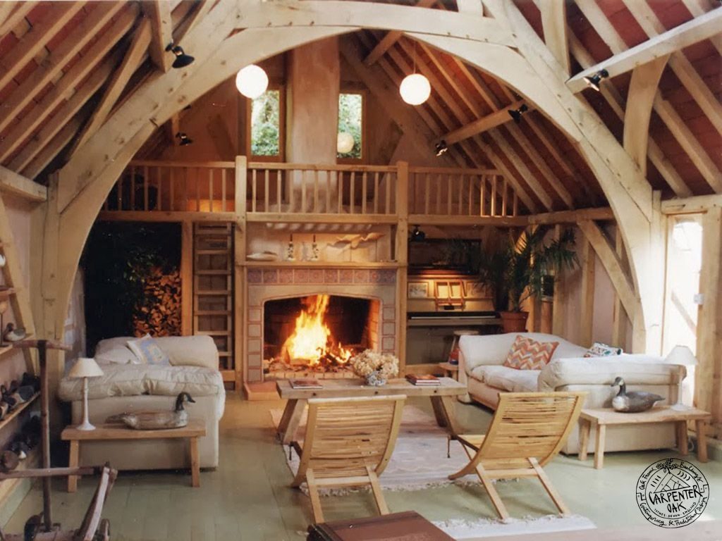 Converted Barn Room Interior with Green Oak Framed Arch Brace Collar Trusses and Gallery