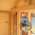 Corner Exposed Oak Post and Brace in New Build Oak Framed Summerhouse in Devon by Carpenter Oak Ltd