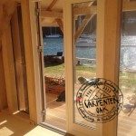 Glazed Doors Detail with River View in Oak Timber Frame New Build Summerhouse in Devon