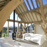 Green Oak Truss Frame with Exposed Rafters and Glazed Roof Section
