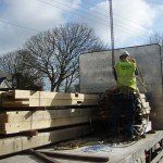 A lorry load of oak beams for a new oak framed house