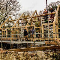 people working hard on a new self build oak frame