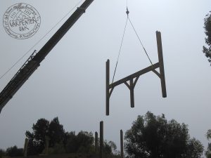 Oak frame parts being installed by crane