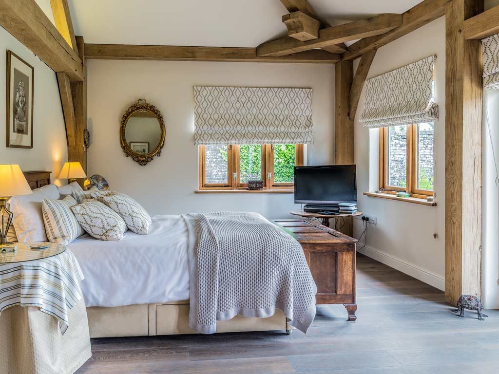 oak frame house master bedroom