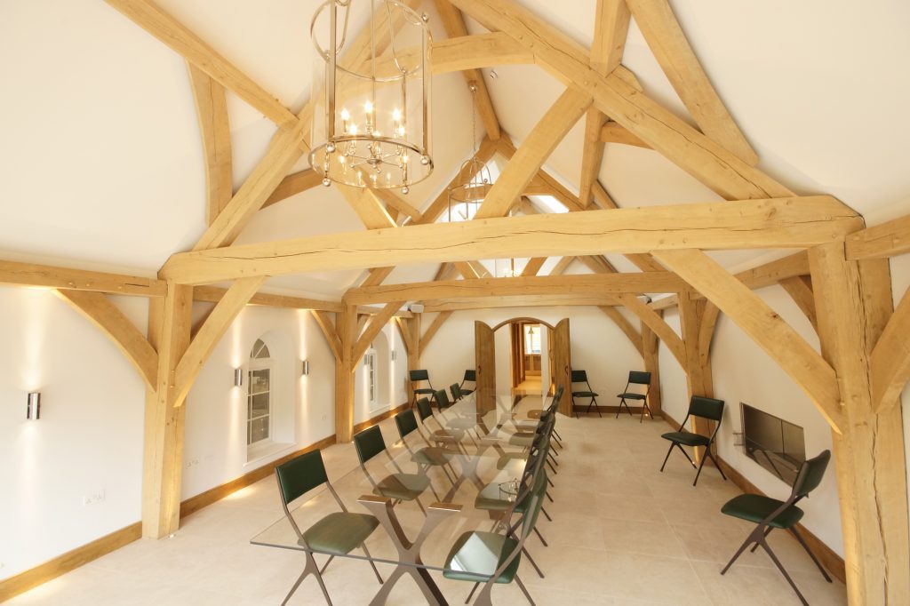 The interior view of the Hundred Hills Winery boardroom with exposed oak frame